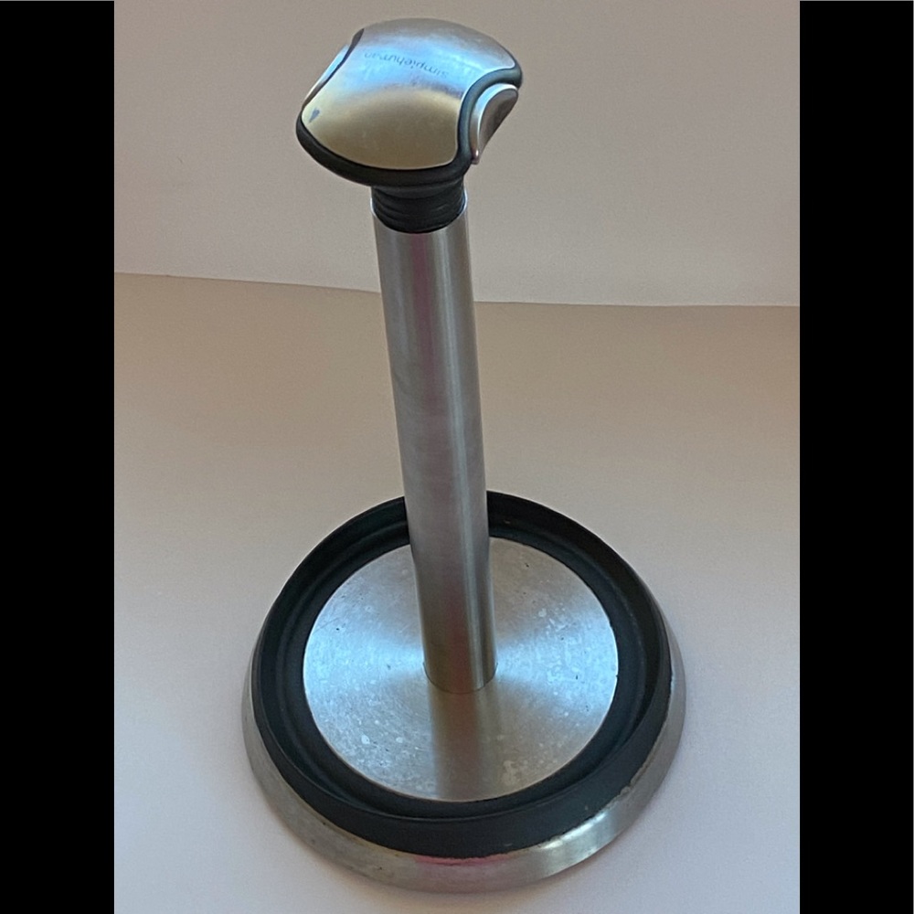 Simple human paper towel holder. Heavy duty. Gently used.
